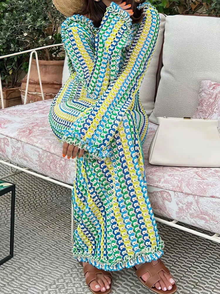 Robe en dentelle dos nu manche longue
